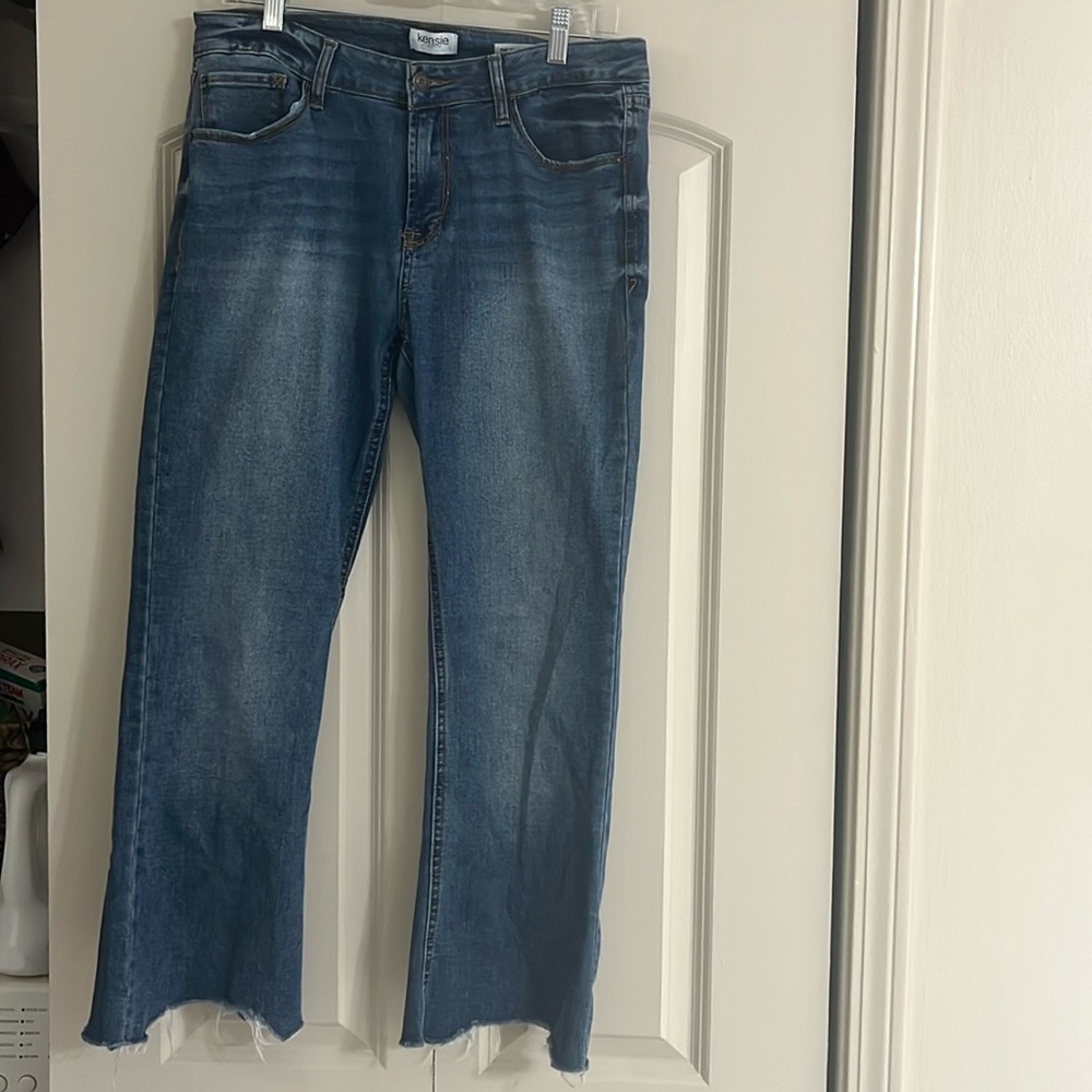Kensie brand light jeans with kind of an ombre tone.
